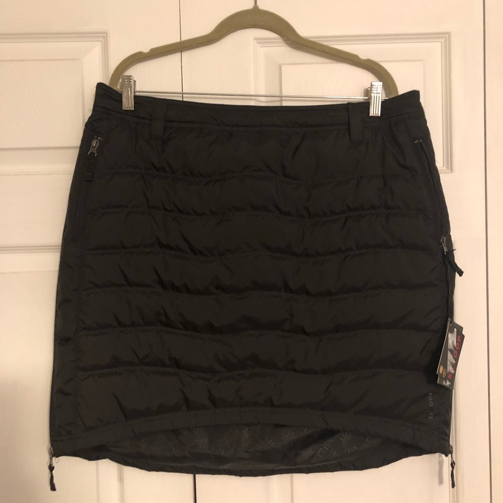 Short, packable down skirt